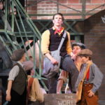 Andrew Wright and the cast of Newsies