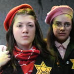 Sophie Williams as Anne Frank and Belle Rangel as Margot Frank in THE DIARY OF ANNE FRANK at The Rose Theater