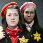 Sophie Williams as Anne Frank and Belle Rangel as Margot Frank in THE DIARY OF ANNE FRANK at The Rose Theater