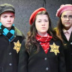 Otto Fox as Peter van Daan, Sophie Williams as Anne Frank and Belle Rangel as Margot Frank in THE DIARY OF ANNE FRANK at The Rose Theater