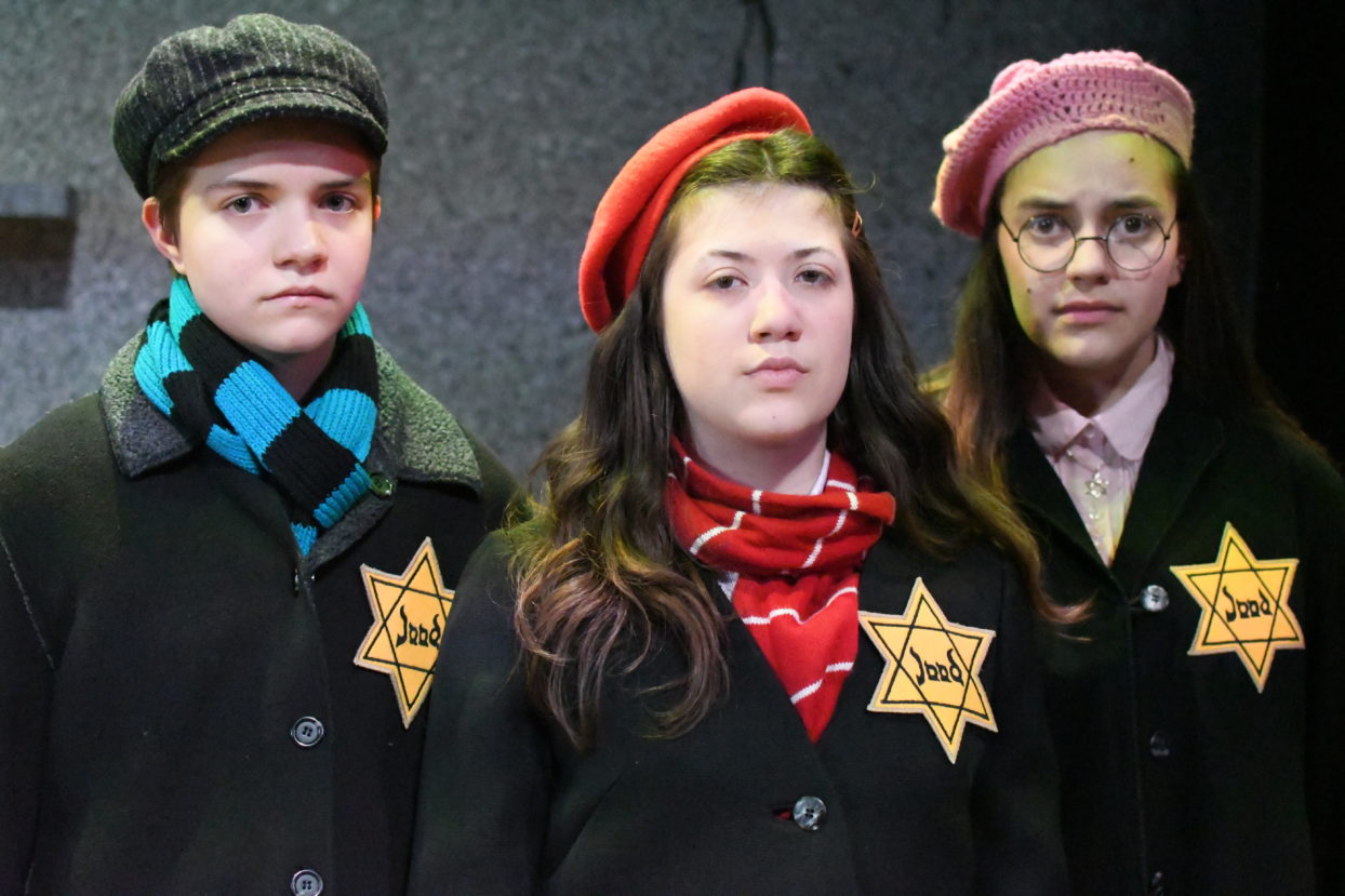 Otto Fox as Peter van Daan, Sophie Williams as Anne Frank and Belle Rangel as Margot Frank in THE DIARY OF ANNE FRANK at The Rose Theater