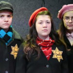 Otto Fox as Peter van Daan, Sophie Williams as Anne Frank and Belle Rangel as Margot Frank in THE DIARY OF ANNE FRANK at The Rose Theater