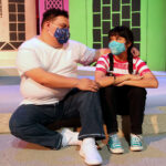 Isaiah Ruiz as Big Brother comforts Mireya Luna as Carmela in The Rose Theater's production of CARMELA FULL OF WISHES, making its world premiere Jan 28 - Feb 13, 2022.