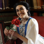 Biannah Peji-Palm as Belle in The Rose Theater's production of BEAUTY AND THE BEAST, playing June 2 - 25, 2023.