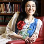 Biannah Peji-Palm as Belle in The Rose Theater's production of BEAUTY AND THE BEAST, playing June 2 - 25, 2023.