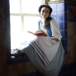 Biannah Peji-Palm as Belle in The Rose Theater's production of BEAUTY AND THE BEAST, playing June 2 - 25, 2023.