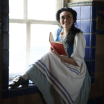 Biannah Peji-Palm as Belle in The Rose Theater's production of BEAUTY AND THE BEAST, playing June 2 - 25, 2023.