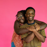 Kevin Jones as Ziggy and Nyarok (Rayn) Tot as Nansi in The Rose Theater's production of BOB MARLEY'S THREE LITTLE BIRDS, playing February 23 - March 10, 2024.