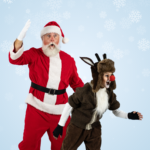 Martin Prieto and Patrick Wolfe as Santa Claus in The Rose Theater's production of RUDOLPH THE RED-NOSED REINDEER, playing December 1 - 23, 2023.