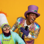 Wayne Hudson II as Willy Wonka and Ren Walther as Oompa Loompa in The Rose Theater's production of CHARLIE AND THE CHOCOLATE FACTORY, playing June 7 - 23, 2024.