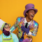 Wayne Hudson II as Willy Wonka and Ren Walther as Oompa Loompa in The Rose Theater's production of CHARLIE AND THE CHOCOLATE FACTORY, playing June 7 - 23, 2024.