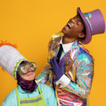 Wayne Hudson II as Willy Wonka and Ren Walther as Oompa Loompa in The Rose Theater's production of CHARLIE AND THE CHOCOLATE FACTORY, playing June 7 - 23, 2024.