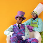 Wayne Hudson II as Willy Wonka and Ren Walther as Oompa Loompa in The Rose Theater's production of CHARLIE AND THE CHOCOLATE FACTORY, playing June 7 - 23, 2024.