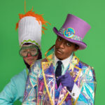 Wayne Hudson II as Willy Wonka and Ren Walther as Oompa Loompa in The Rose Theater's production of CHARLIE AND THE CHOCOLATE FACTORY, playing June 7 - 23, 2024.
