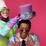 Wayne Hudson II as Willy Wonka and Ren Walther as Oompa Loompa in The Rose Theater's production of CHARLIE AND THE CHOCOLATE FACTORY, playing June 7 - 23, 2024.