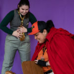 Carina DuMarce as Delivery Person and Rachel Smart as Wolfgang in The Rose Theater's production of RED RIDING HOOD, playing March 22 - April 7, 2024.