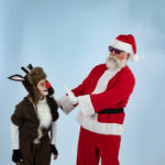 Martin Prieto and Patrick Wolfe as Santa Claus in The Rose Theater's production of RUDOLPH THE RED-NOSED REINDEER, playing December 1 - 23, 2023.