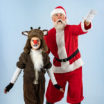 Martin Prieto and Patrick Wolfe as Santa Claus in The Rose Theater's production of RUDOLPH THE RED-NOSED REINDEER, playing December 1 - 23, 2023.