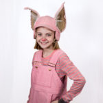 Scarlett Simpson as Wilbur in The Rose Theater's production of CHARLOTTE'S WEB, playing April 19 - May 5, 2024.-01