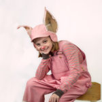 Scarlett Simpson as Wilbur in The Rose Theater's production of CHARLOTTE'S WEB, playing April 19 - May 5, 2024.-01