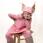 Scarlett Simpson as Wilbur in The Rose Theater's production of CHARLOTTE'S WEB, playing April 19 - May 5, 2024.-01