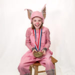Scarlett Simpson as Wilbur in The Rose Theater's production of CHARLOTTE'S WEB, playing April 19 - May 5, 2024.-01