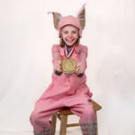 Scarlett Simpson as Wilbur in The Rose Theater's production of CHARLOTTE'S WEB, playing April 19 - May 5, 2024.-01