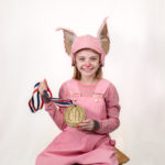 Scarlett Simpson as Wilbur in The Rose Theater's production of CHARLOTTE'S WEB, playing April 19 - May 5, 2024.-01