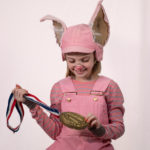 Scarlett Simpson as Wilbur in The Rose Theater's production of CHARLOTTE'S WEB, playing April 19 - May 5, 2024.-01