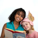 Scarlett Simpson as Wilbur and Mahalet Kinde as Fern in The Rose Theater's production of CHARLOTTE'S WEB, playing April 19 - May 5, 2024.