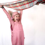 Scarlett Simpson as Wilbur in The Rose Theater's production of CHARLOTTE'S WEB, playing April 19 - May 5, 2024.-01