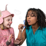 Scarlett Simpson as Wilbur and Mahalet Kinde as Fern in The Rose Theater's production of CHARLOTTE'S WEB, playing April 19 - May 5, 2024.