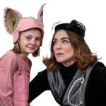 Scarlett Simpson as Wilbur and Miriam Gutiérrez as Charlotte in The Rose Theater's production of CHARLOTTE'S WEB, playing April 19 - May 5, 2024.